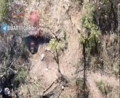 Ukrainian drone-dropped grenade attacks on Russian positions. A Russian soldier on fire emerges from a bunker at one point. Another Russian returns fire at the drone but misses. from melissa fire
