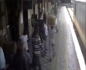 Guy walking trips and falls underneath a moving train from amrapali express train size 240 320