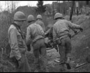 US personnel recover the remains of a fellow soldier killed by German artillery at the French commune of Sarre-Union near the German border on December 7th 1944 from soni sarre vlog