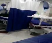 [Warning graphic context] Video purported from Iran showing 2 nurses putting patient in body bag. 1 nurse allegedly mentions the patient is not deceased. The other nurse continues &#34;unfazed&#34;. This translation has not been verified independently but from sxs iran