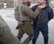 Israeli soldier assaults Palestinian activist in full view of camera from nude show infornt of camera mp4
