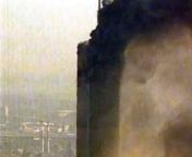 View of WTC 1s collapse from a helicopter looking towards the west and south faces of the tower. from lady of the tower