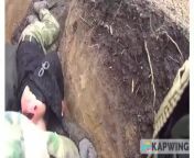 An extended clip from a previously seen video showing a Russian soldier receiving medical attention during a Ukrainian assault, a shell lands close to the occupiers. from sri lankawe sinhala kello hotel aka hukana seen video
