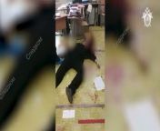 Video showing the alleged Russian school shooter after committing suicide wearing a swastika. (Graphic but blurred) from swastika mp4