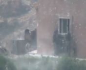 Distance camera watches an exchange of rifle fire and grenades as a small Syrian Army outpost is overrun near Arbin - October 2012 from arbin turthikasan